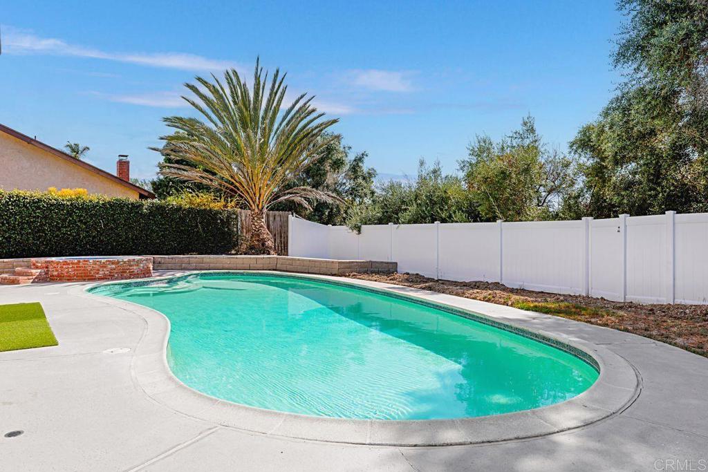 1917 Comanche Street Oceanside, CA 92056 - Photo 33 of 39 a view of a swimming pool with a yard and plants