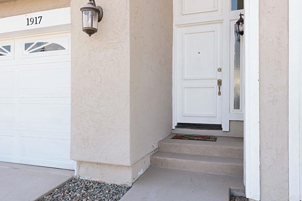 1917 Comanche Street Oceanside, CA 92056 - Photo 4 of 39 a view of a closet area with living room