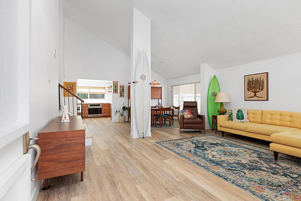 1917 Comanche Street Oceanside, CA 92056 - Photo 5 of 39 a living room with furniture and wooden floor
