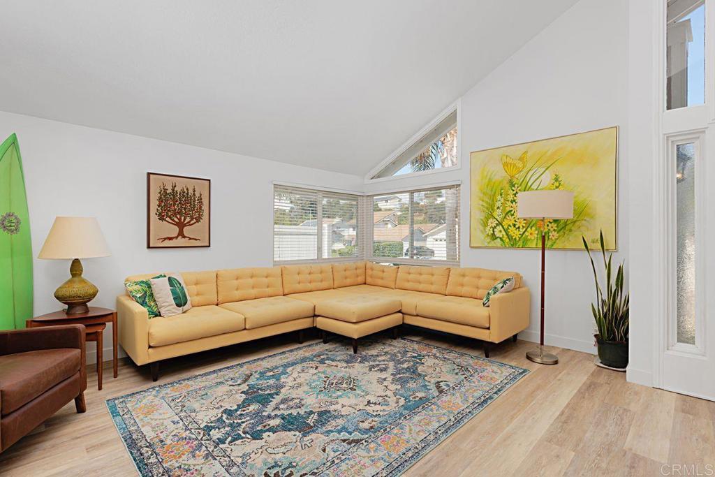 1917 Comanche Street Oceanside, CA 92056 - Photo 7 of 39 a living room with furniture and a large window