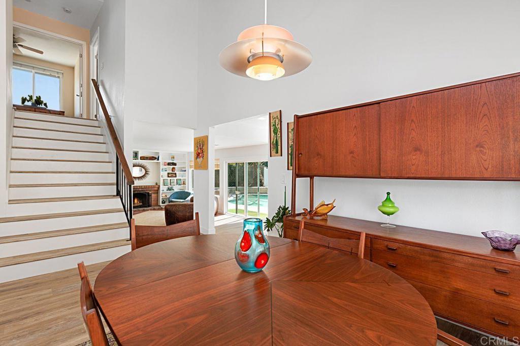 1917 Comanche Street Oceanside, CA 92056 - Photo 9 of 39 a living room with furniture and a dining table