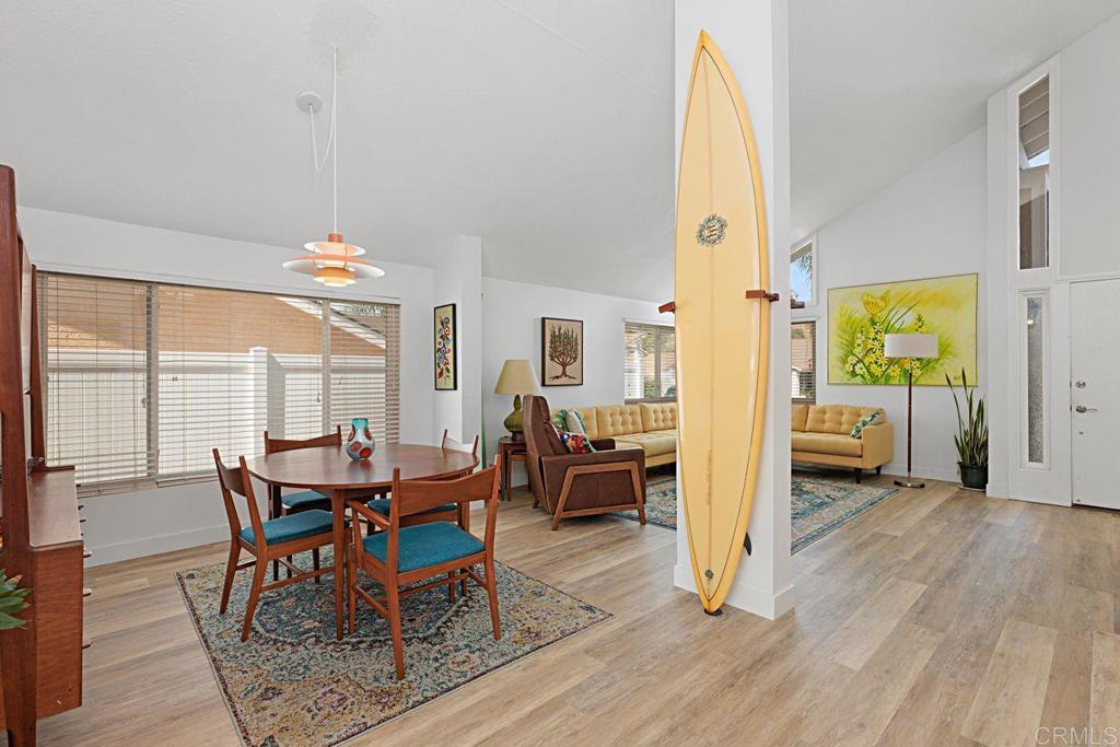 1917 Comanche Street Oceanside, CA 92056 - Photo 10 of 39 a view of a dining room with furniture and wooden floor