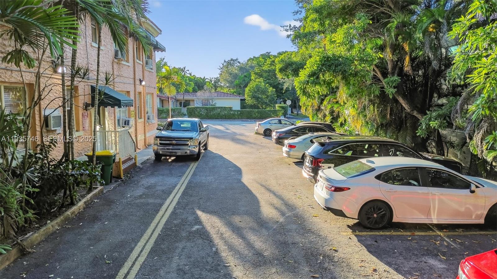 3409 South Le Jeune Road, Unit 5 Coral Gables, FL 33134 - Photo 12 of 14 a front view of a house with parking space