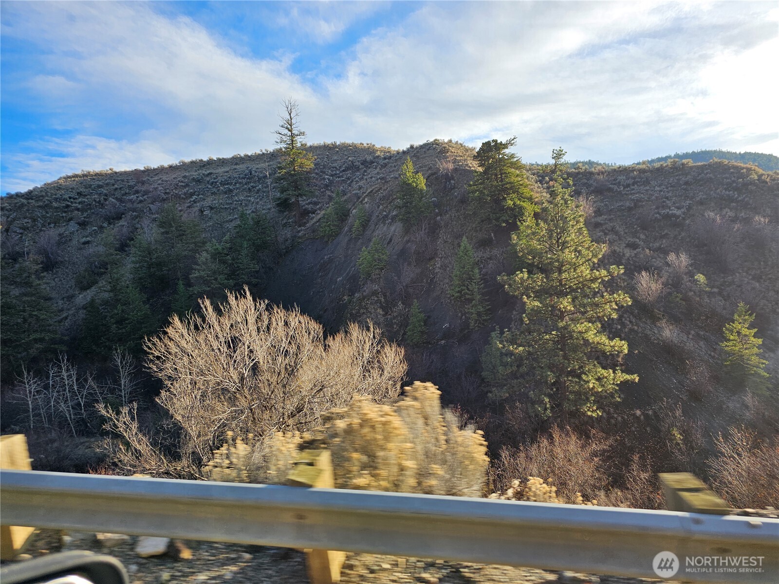 21 Pine Grove Road, Unit LOT 47 Oroville, WA 98844 - Photo 18 of 29 a view of a yard from a window