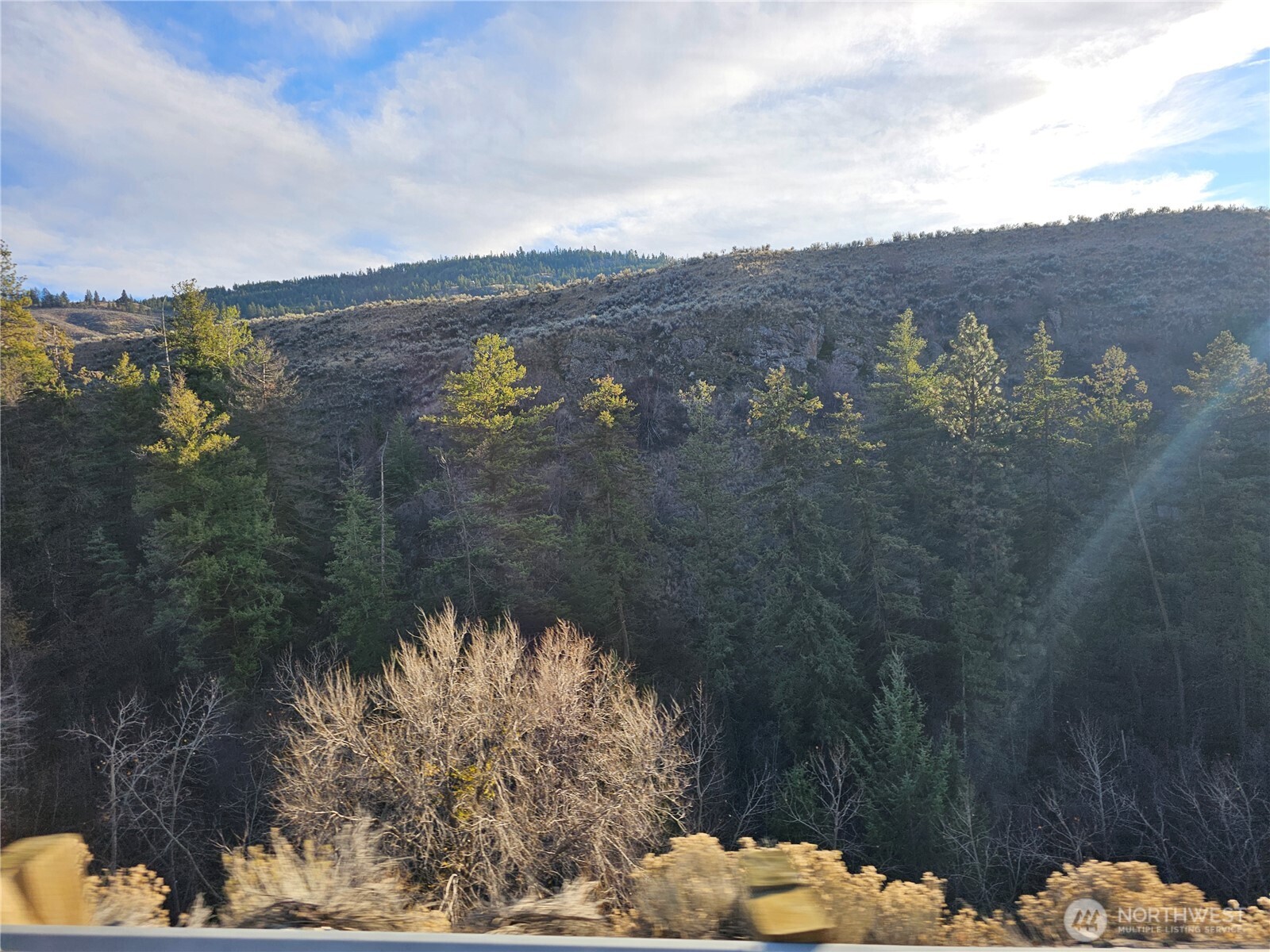 21 Pine Grove Road, Unit LOT 47 Oroville, WA 98844 - Photo 21 of 29 a view of a sky from a balcony