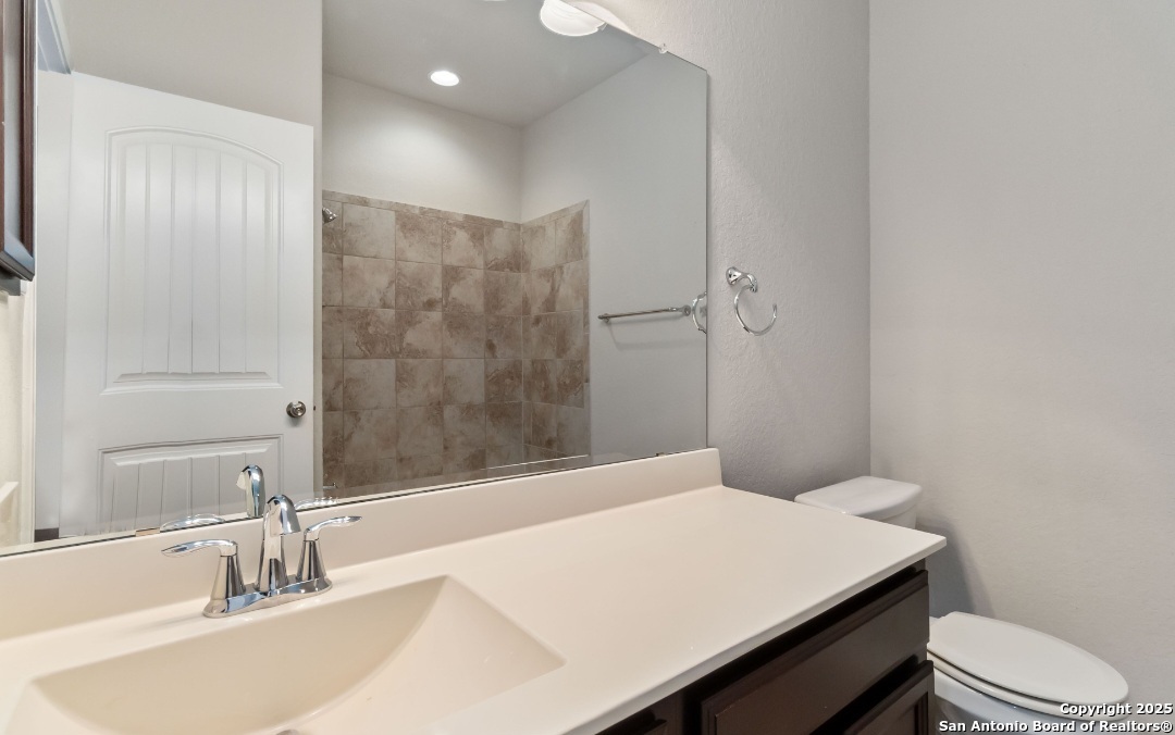 629 Cavan Cibolo, TX 78108 - Photo 14 of 20 a bathroom with a sink a toilet and shower