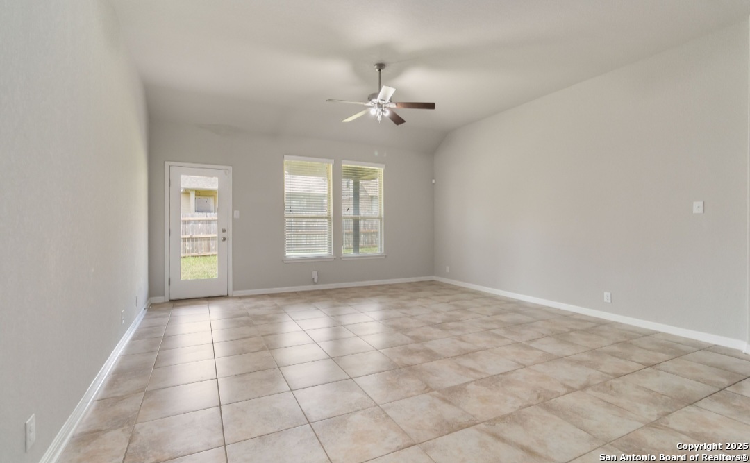 629 Cavan Cibolo, TX 78108 - Photo 17 of 20 an empty room with windows and ceiling fan