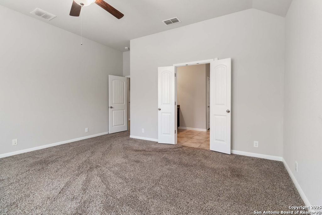 629 Cavan Cibolo, TX 78108 - Photo 5 of 20 an empty room with chandelier fan
