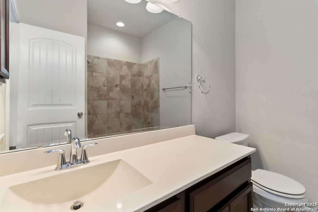 629 Cavan Cibolo, TX 78108 - Photo 7 of 20 a bathroom with a sink a toilet and shower