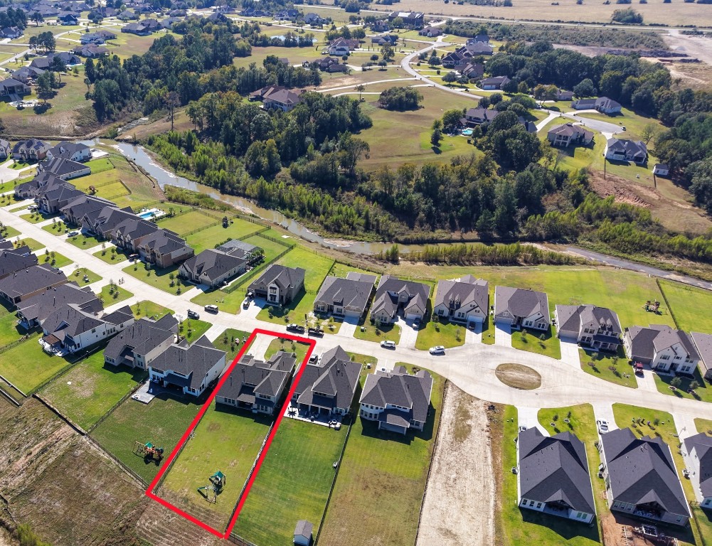 225 Peninsula Point Drive Montgomery, TX 77356 - Photo 2 of 38 a picture of city view with outdoor space
