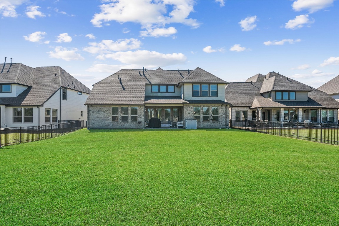 225 Peninsula Point Drive Montgomery, TX 77356 - Photo 35 of 38 a view of a house with a big yard