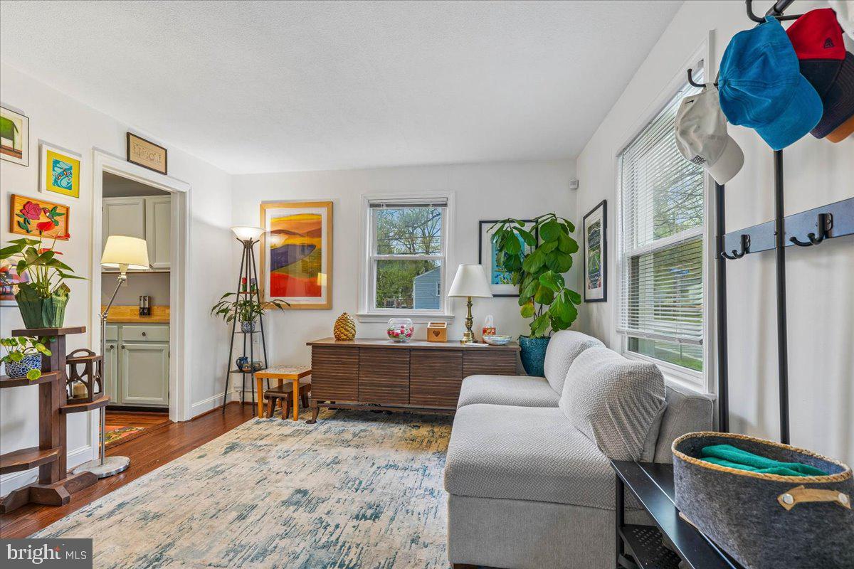4801 Nicholson Street Riverdale, MD 20737 - Photo 11 of 39 a living room with furniture and a large window