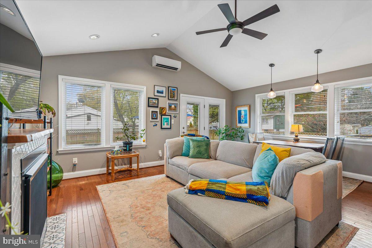 4801 Nicholson Street Riverdale, MD 20737 - Photo 19 of 39 a living room with furniture and a floor to ceiling window