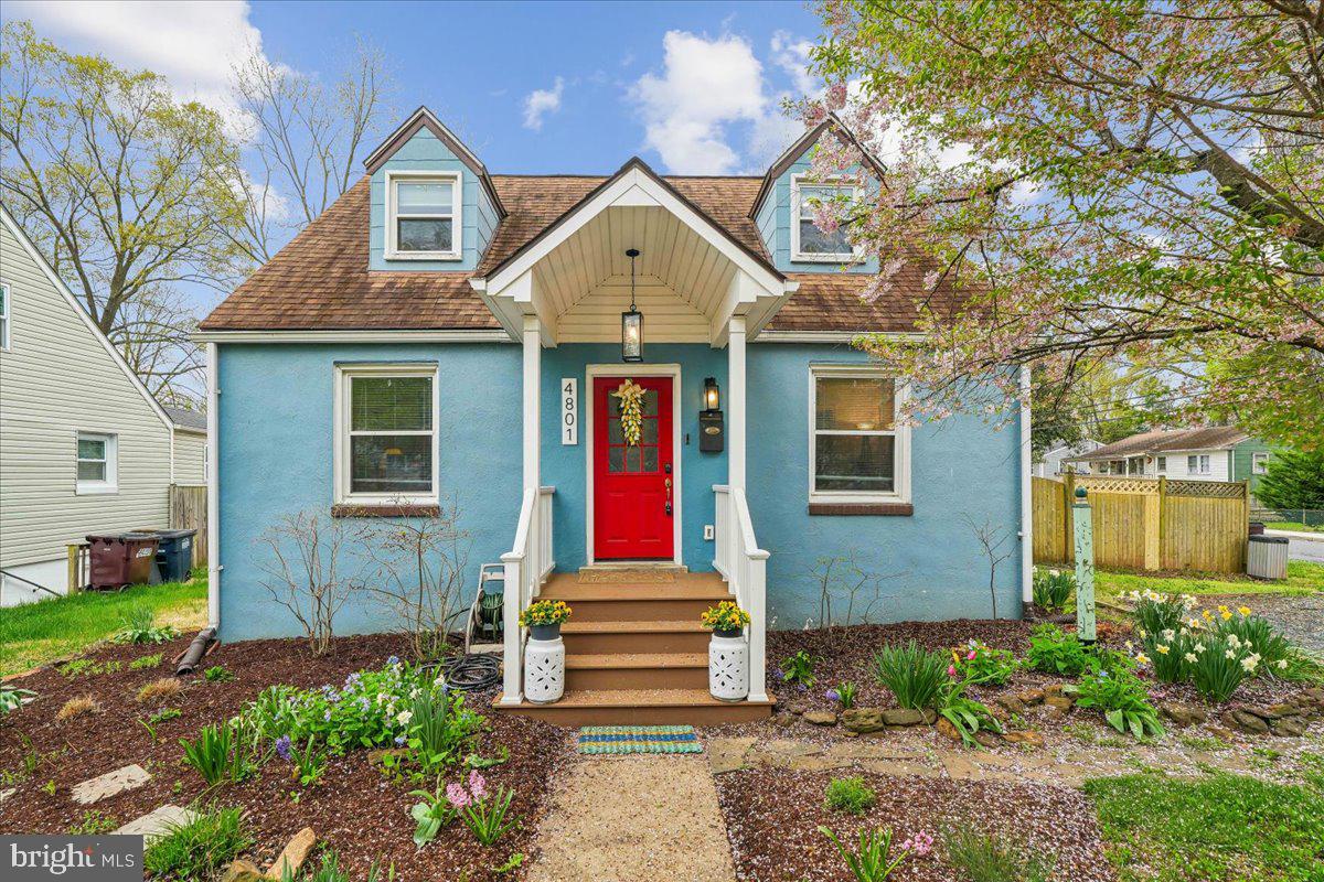 4801 Nicholson Street Riverdale, MD 20737 - Photo 2 of 39 a front view of a house with a yard