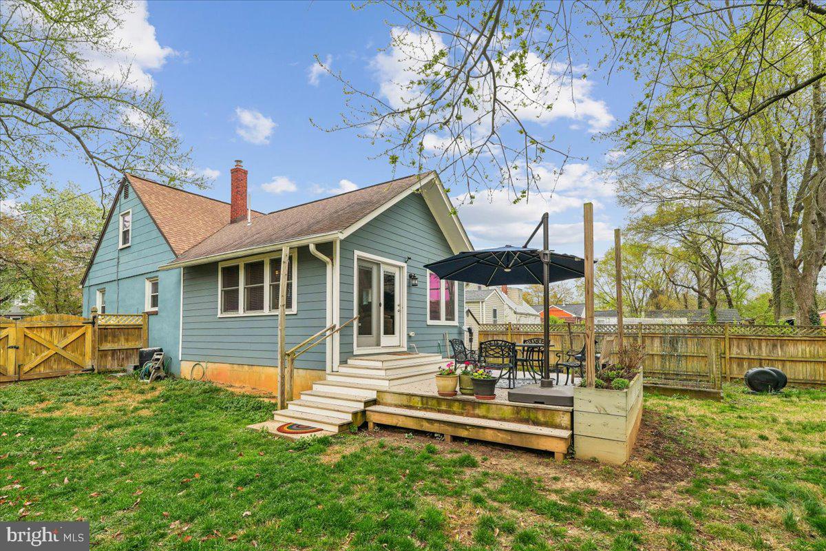 4801 Nicholson Street Riverdale, MD 20737 - Photo 6 of 39 a front view of a house with a garden