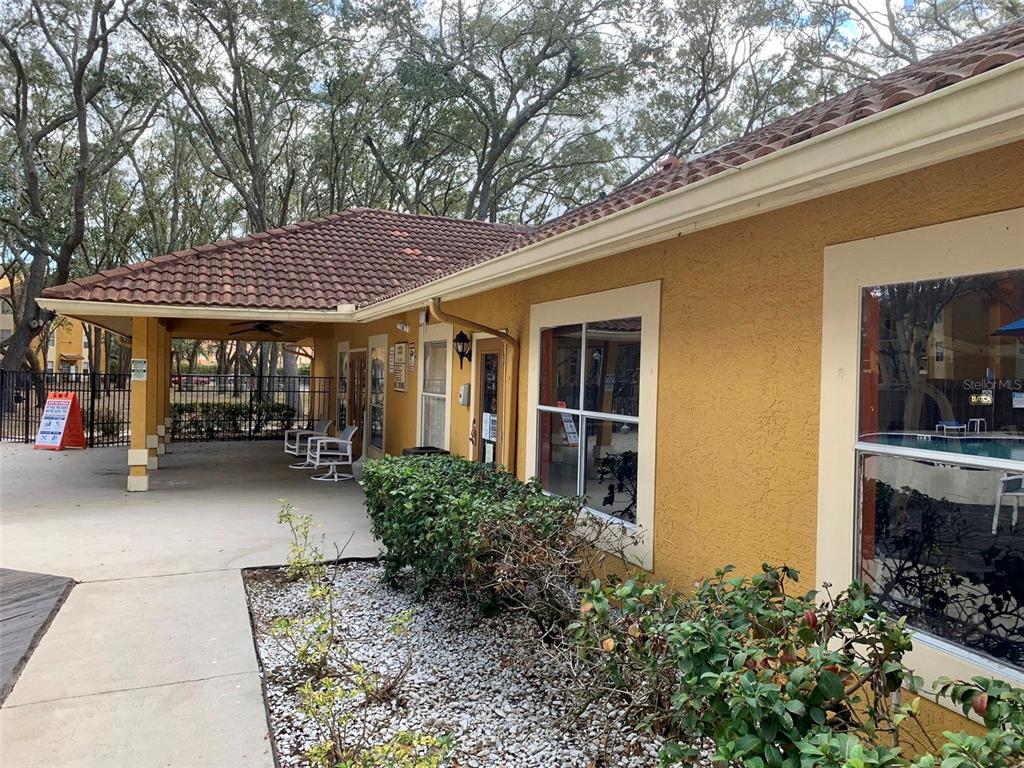 5263 Images Circle, Unit 106 Kissimmee, FL 34746 - Photo 13 of 17 a view of a house with tub and porch