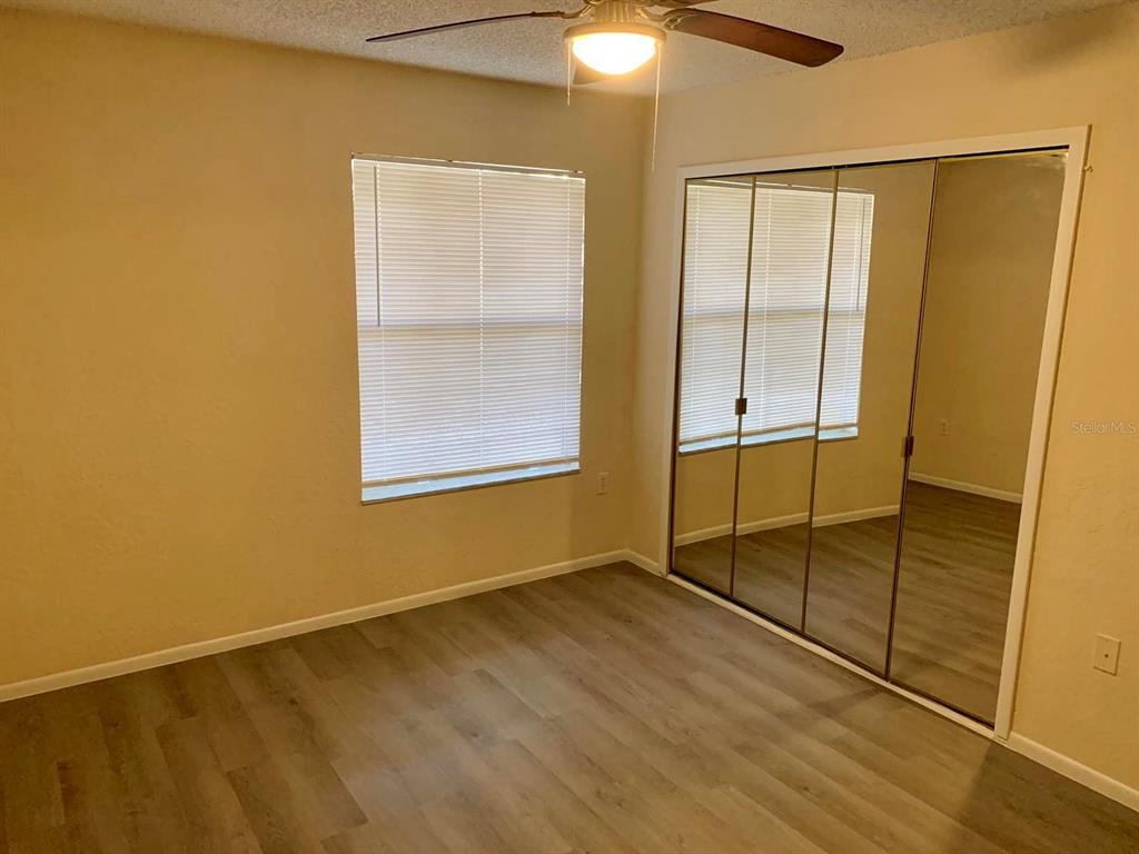 5263 Images Circle, Unit 106 Kissimmee, FL 34746 - Photo 5 of 17 a view of an empty room and window