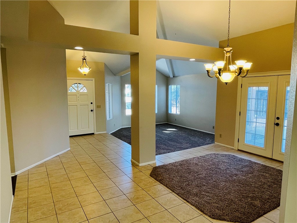 41915 Avenida Sonoma Temecula, CA 92591 - Photo 17 of 60 a view of a hallway with wooden floor