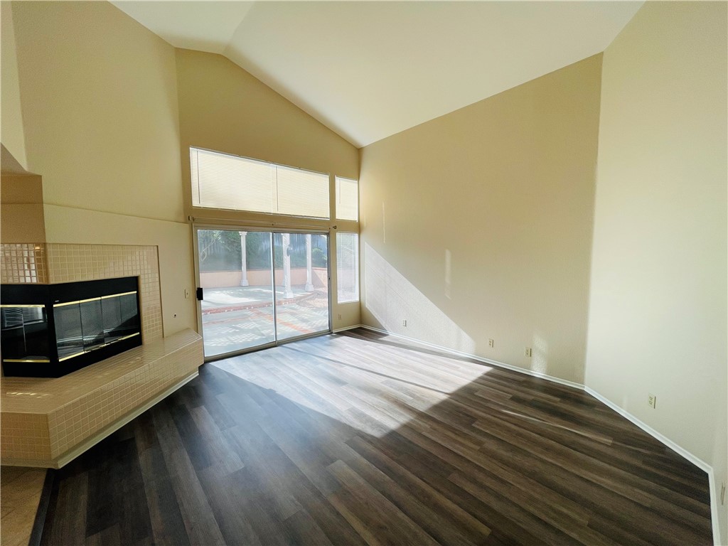 41915 Avenida Sonoma Temecula, CA 92591 - Photo 18 of 60 a view of an empty room with wooden floor and a window