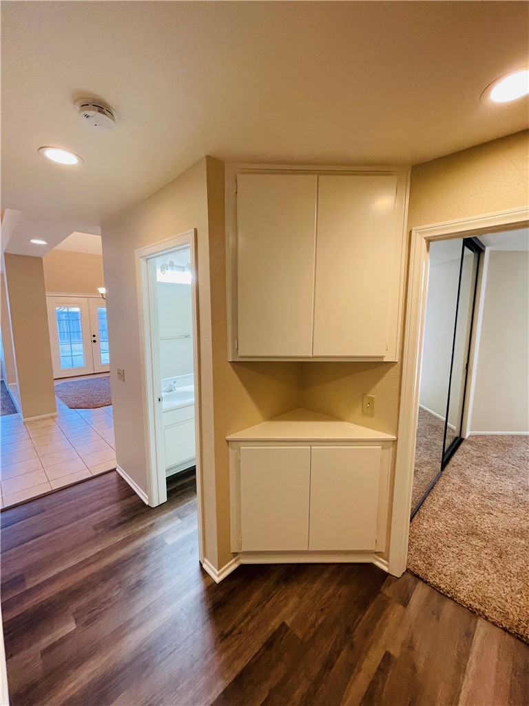 41915 Avenida Sonoma Temecula, CA 92591 - Photo 27 of 60 a kitchen with wooden floor and cabinets