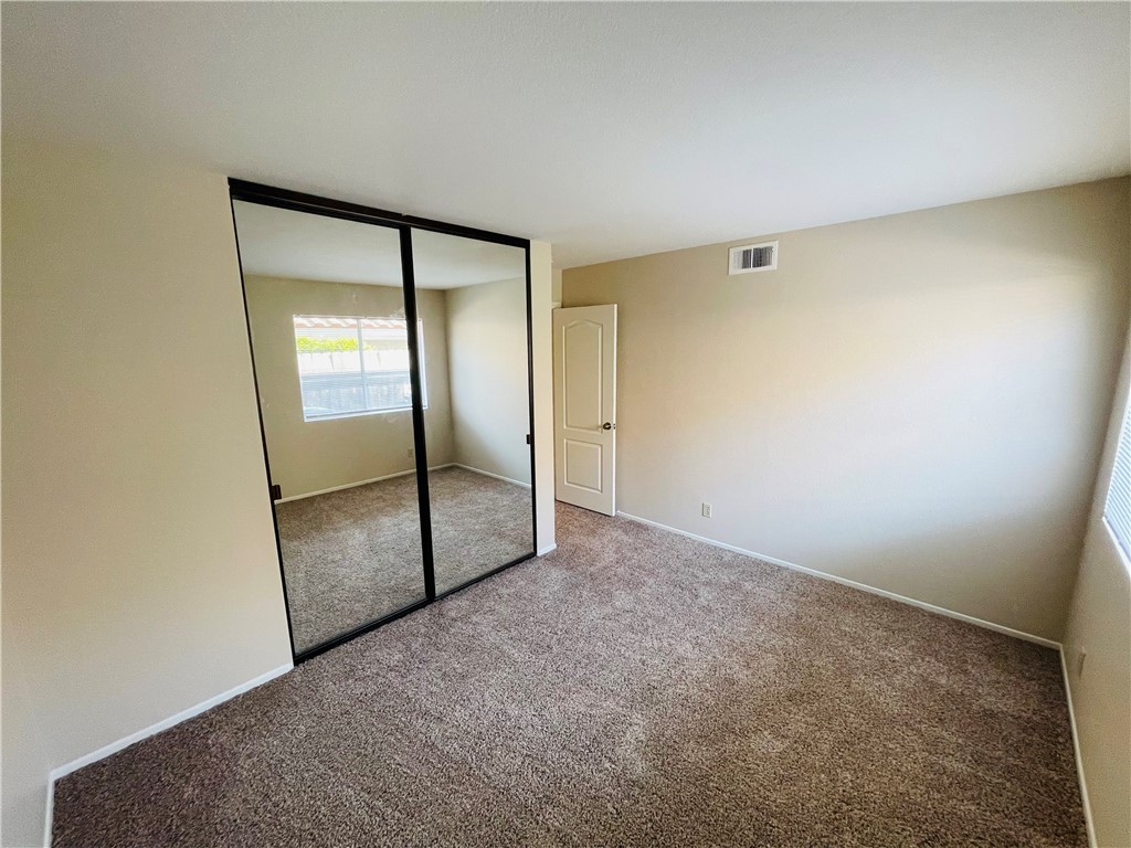 41915 Avenida Sonoma Temecula, CA 92591 - Photo 31 of 60 an empty room with mirror in closet
