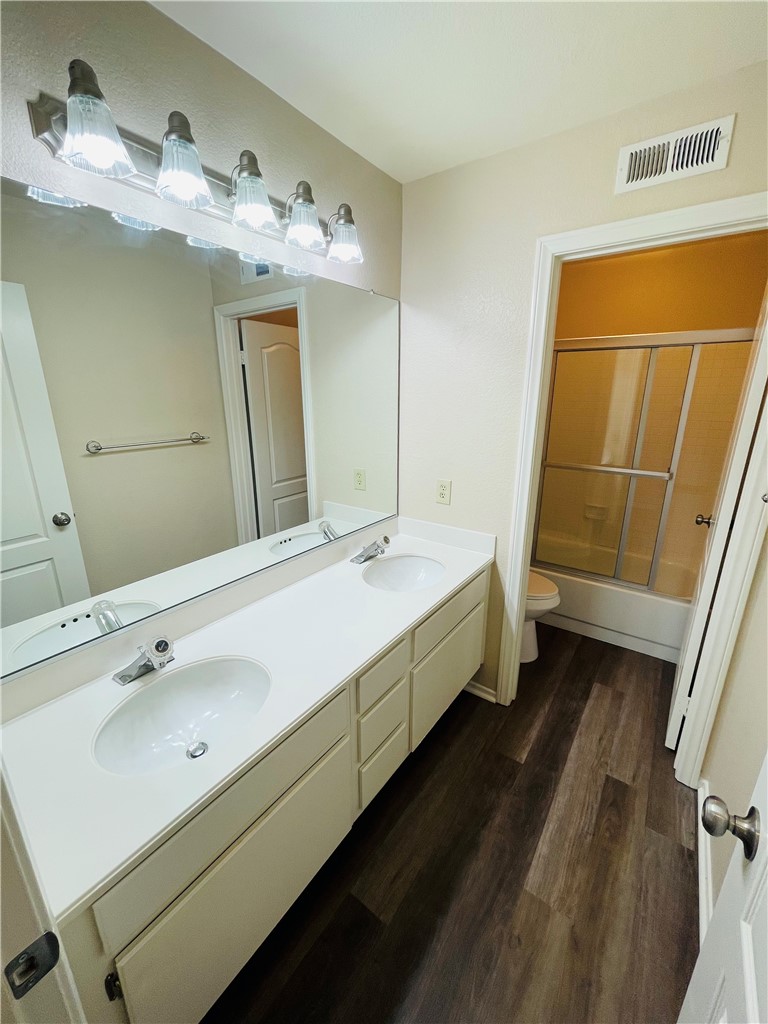 41915 Avenida Sonoma Temecula, CA 92591 - Photo 32 of 60 a bathroom with a double vanity sink and mirror