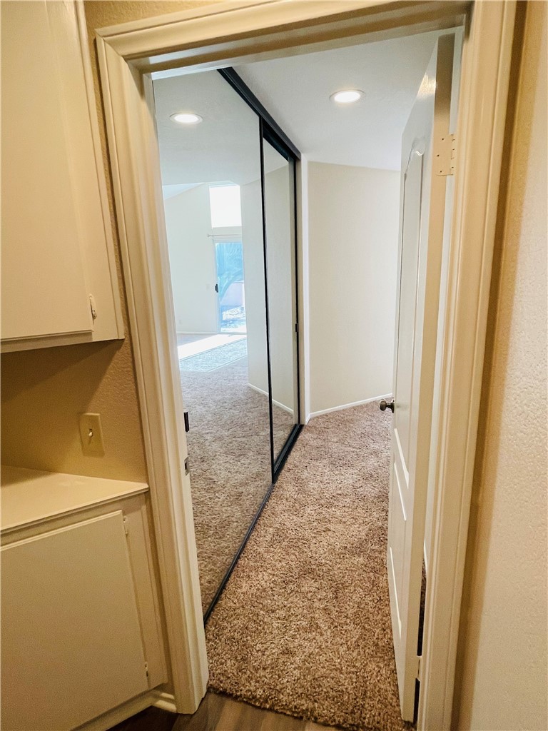 41915 Avenida Sonoma Temecula, CA 92591 - Photo 33 of 60 a view of hallway with wooden floor