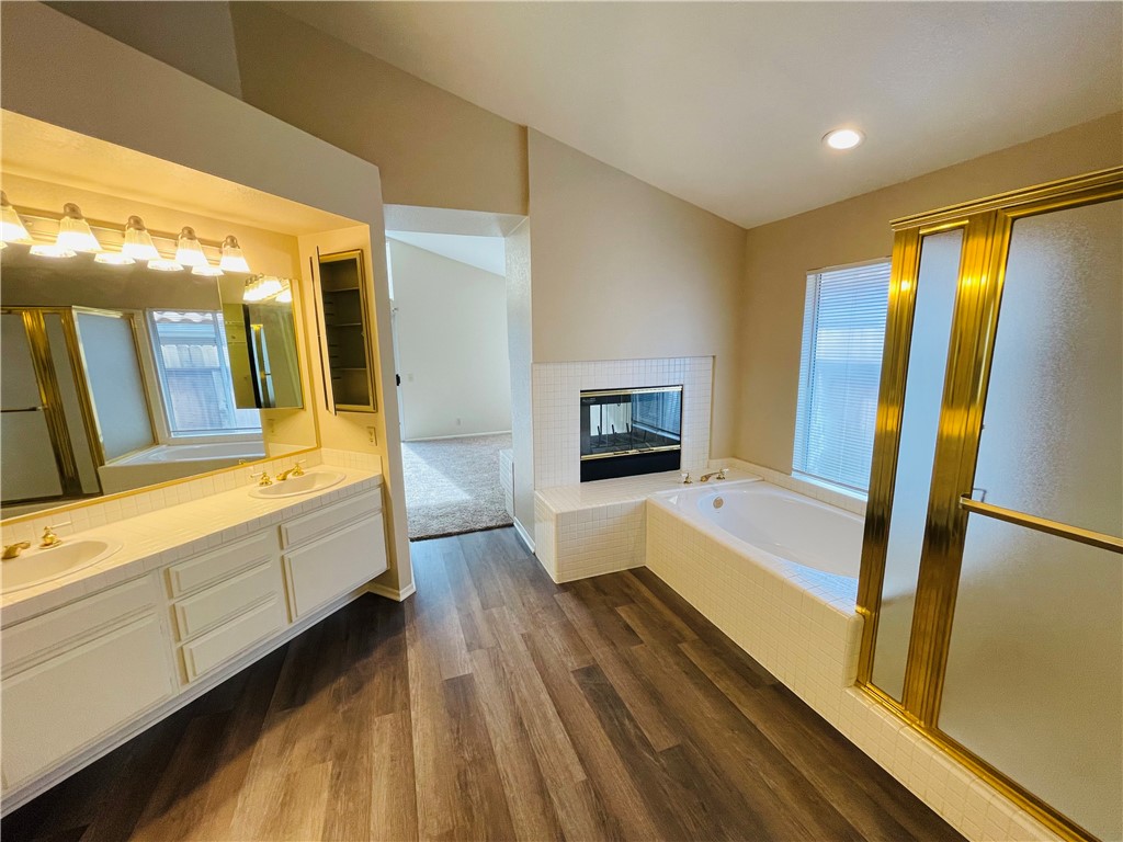 41915 Avenida Sonoma Temecula, CA 92591 - Photo 40 of 60 a large white kitchen with sink stainless steel appliances and furniture