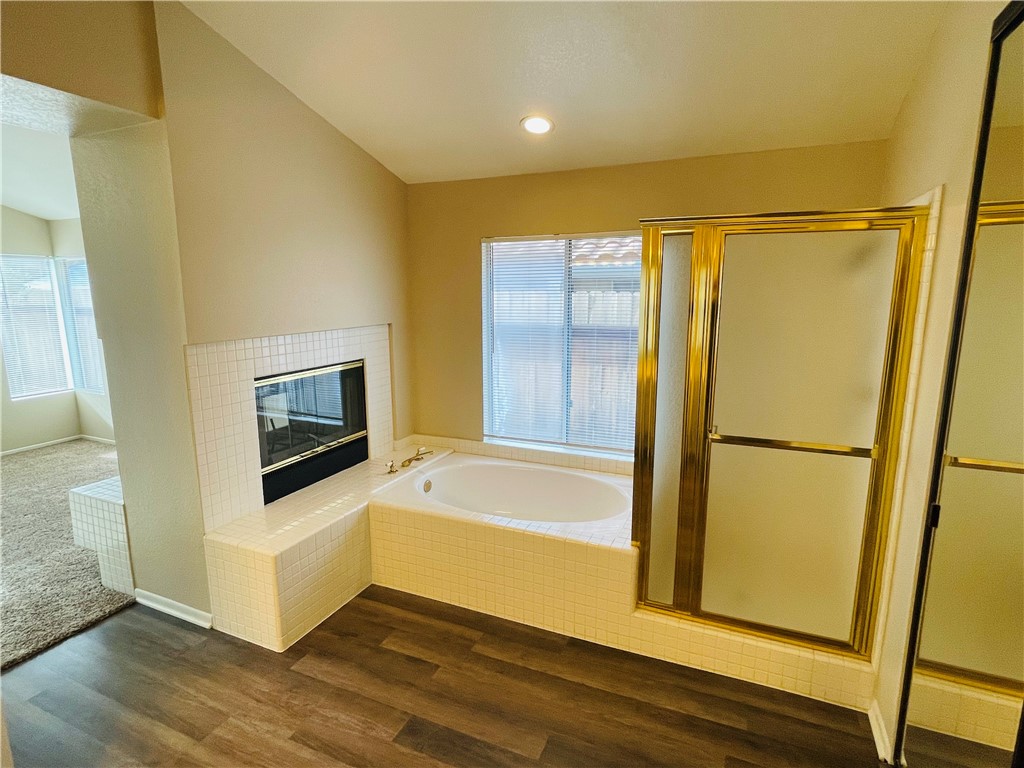 41915 Avenida Sonoma Temecula, CA 92591 - Photo 41 of 60 a bathroom with a tub and a shower