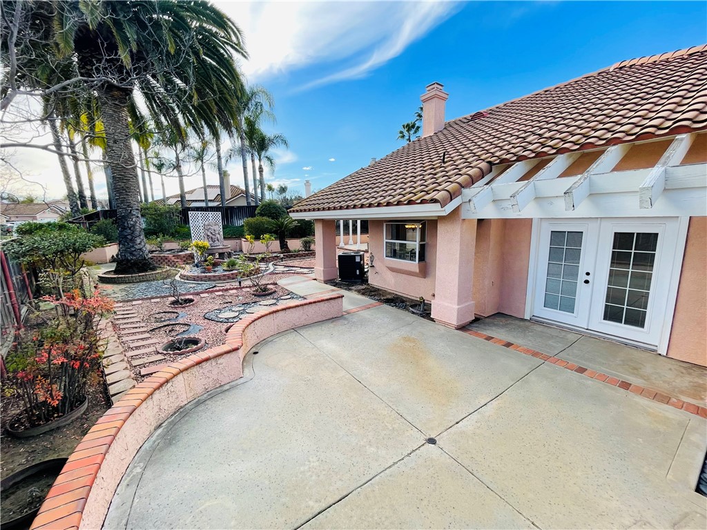 41915 Avenida Sonoma Temecula, CA 92591 - Photo 50 of 60 a row of palm trees in front of house