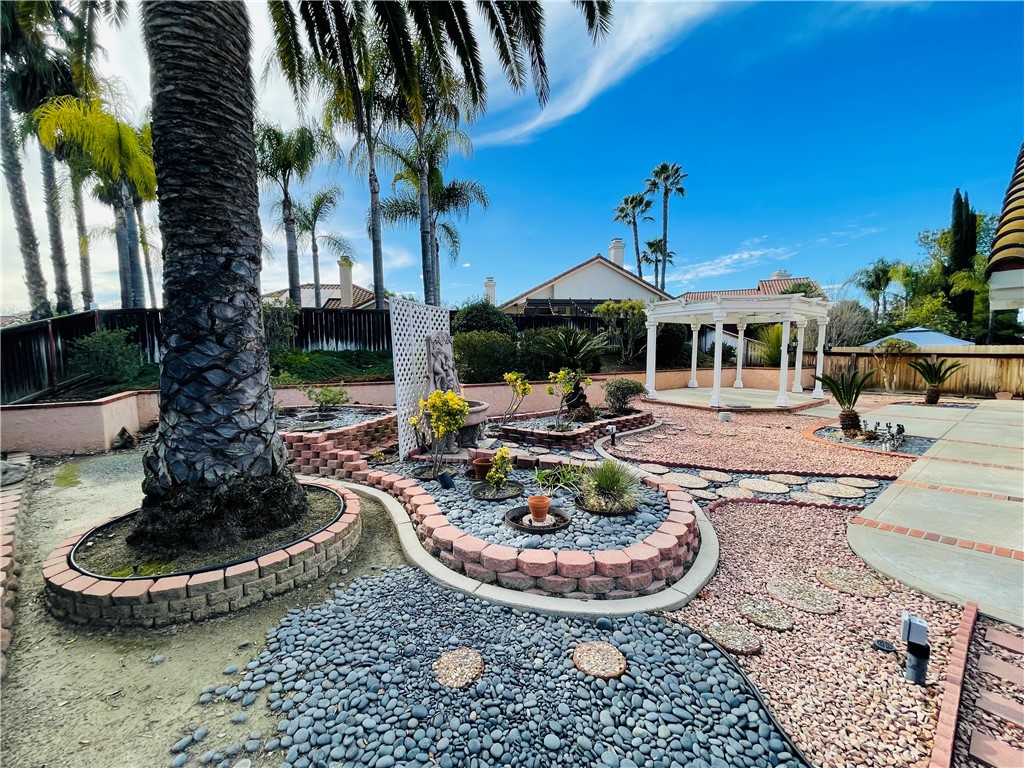 41915 Avenida Sonoma Temecula, CA 92591 - Photo 53 of 60 a view of a swimming pool with a patio