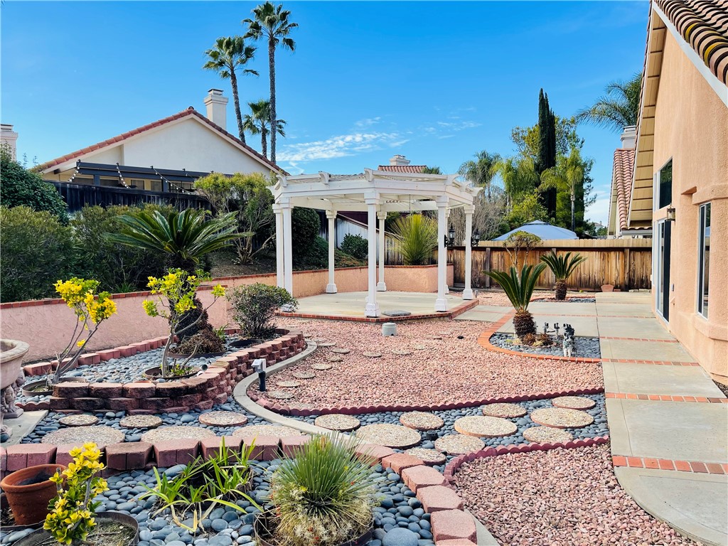 41915 Avenida Sonoma Temecula, CA 92591 - Photo 54 of 60 a front view of a house with swimming pool