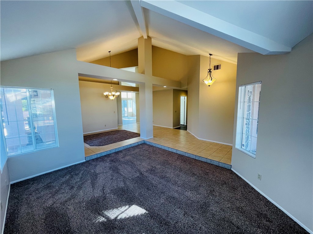 41915 Avenida Sonoma Temecula, CA 92591 - Photo 8 of 60 a view of an empty room with a fireplace