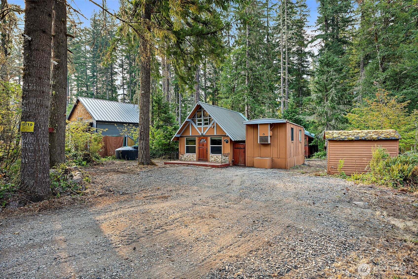 270 Skate Creek Road North Ashford, WA 98304 - Photo 34 of 36 a view of a house with a yard and large tree