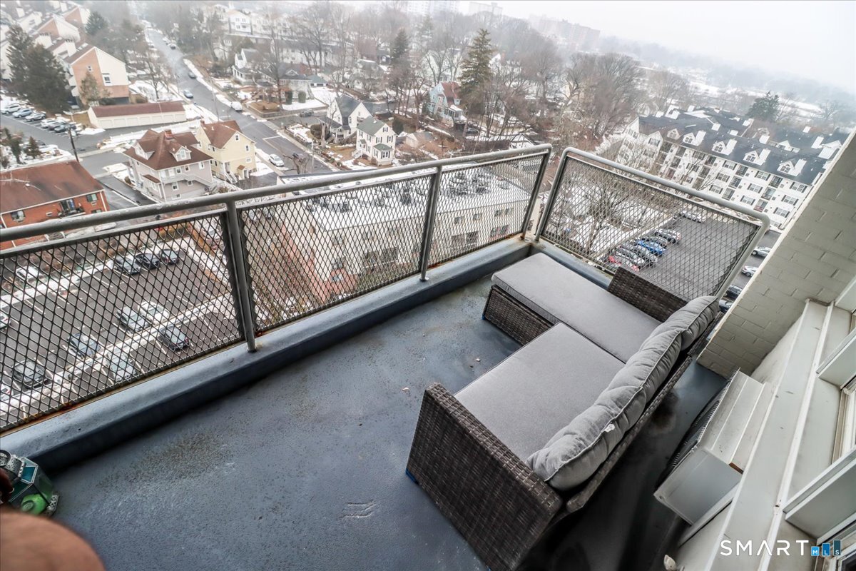 30 Glenbrook Road, Unit 10F Stamford, CT 06902 - Photo 18 of 30 a view of a balcony with furniture
