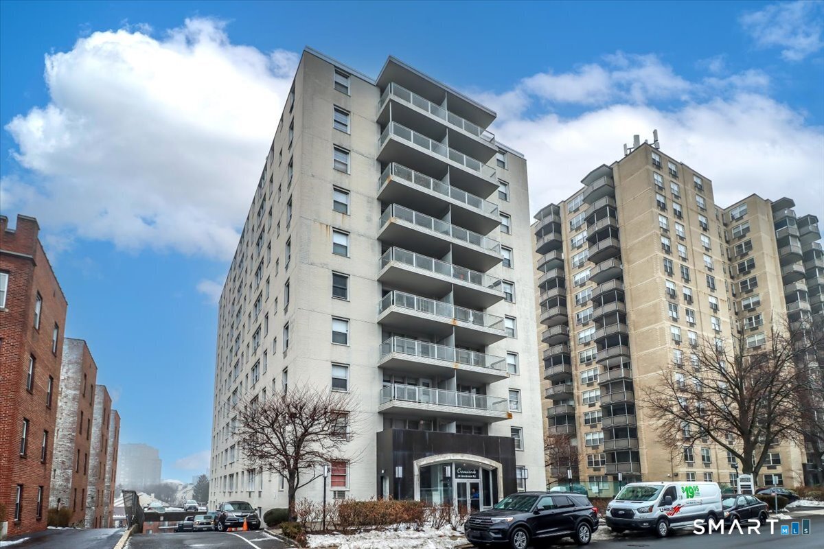 30 Glenbrook Road, Unit 10F Stamford, CT 06902 - Photo 25 of 30 a front view of a building