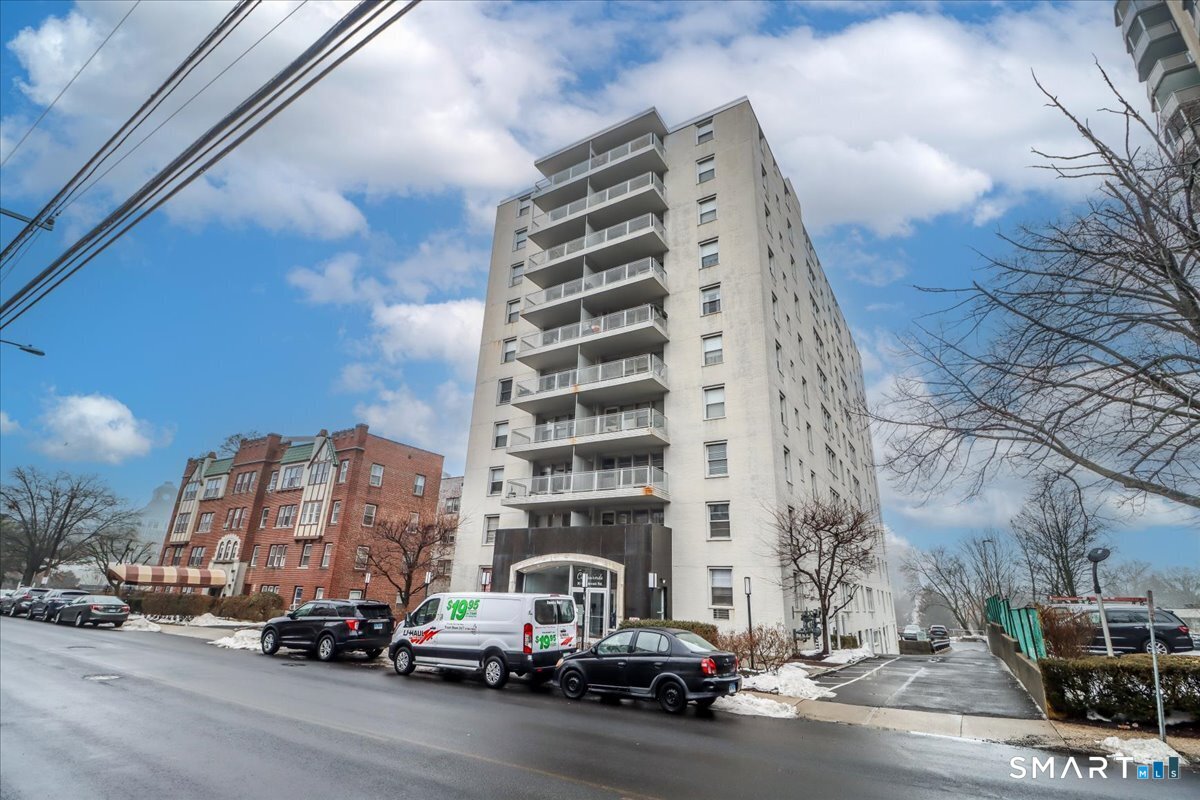 30 Glenbrook Road, Unit 10F Stamford, CT 06902 - Photo 27 of 30 a view of a street with cars