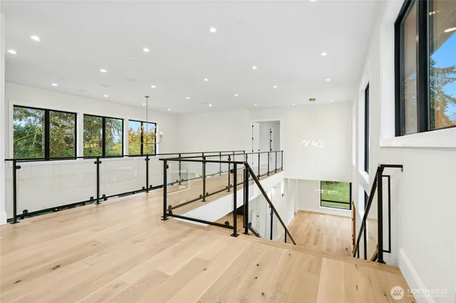a bathroom with a granite countertop sink a toilet and shower