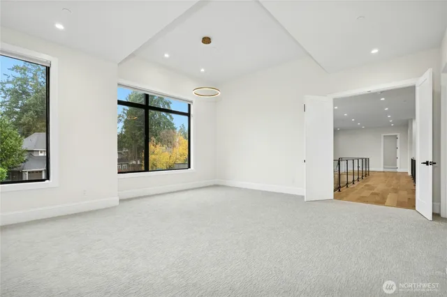 a bathroom with a granite countertop sink a toilet and a bathtub