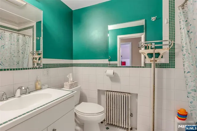 a bathroom with a sink and a toilet