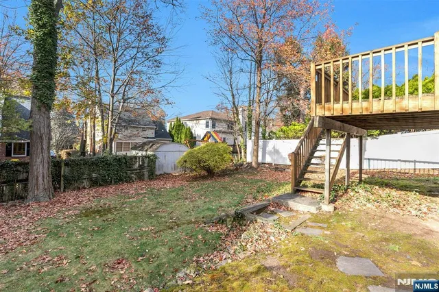 a view of a yard with a slide