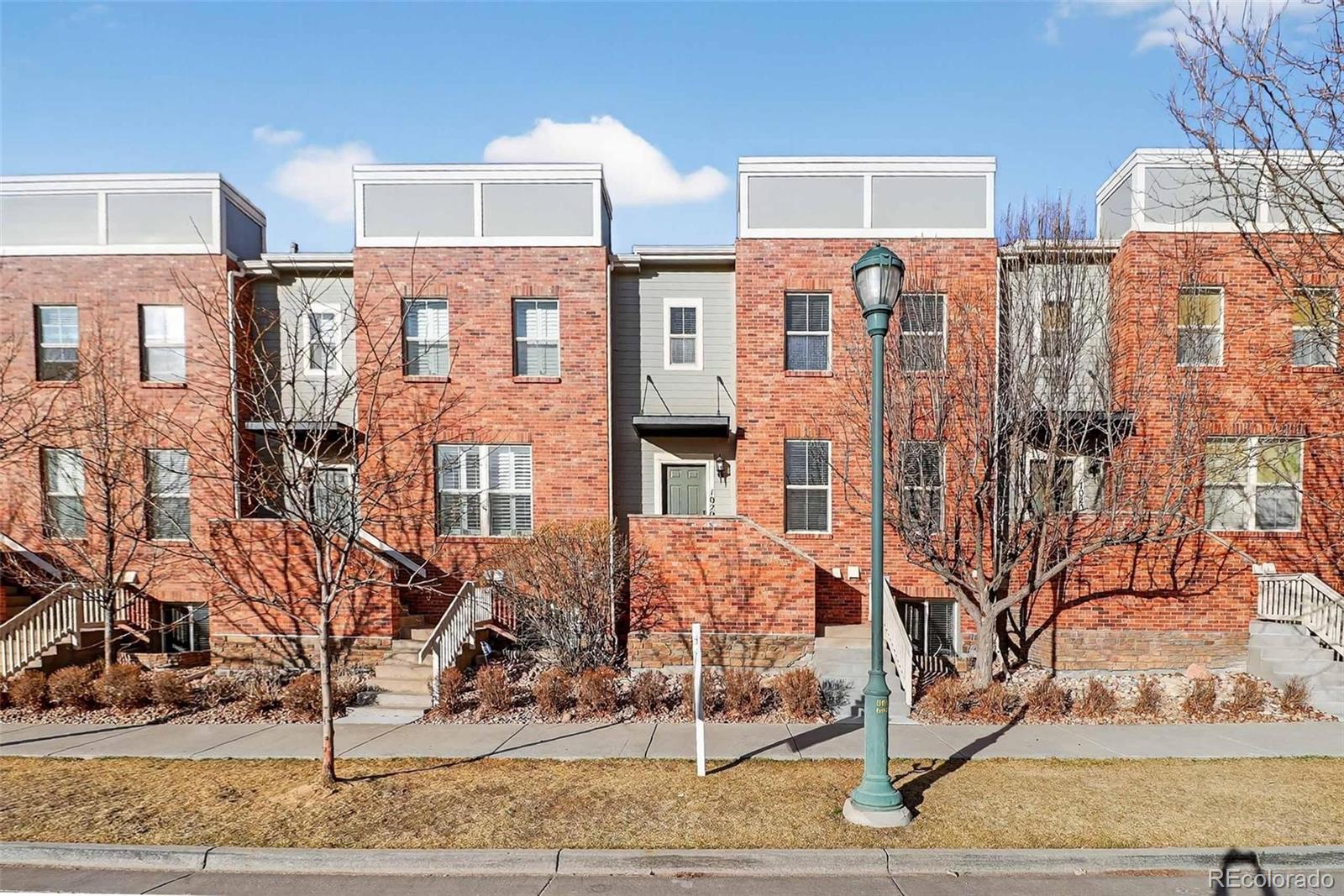 a front view of a multi story residential apartment building