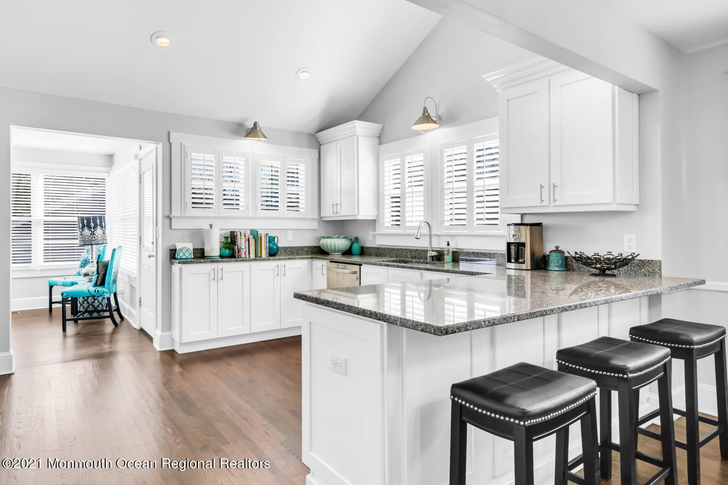 72 Rumson Road Little Silver, NJ 07739 - Photo 3 of 27 a kitchen with stainless steel appliances granite countertop a table chairs sink and cabinets