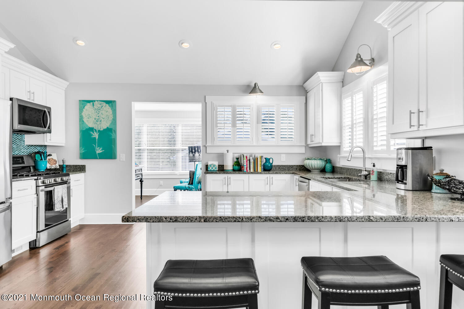 72 Rumson Road Little Silver, NJ 07739 - Photo 4 of 27 a kitchen with stainless steel appliances granite countertop a stove a sink and a microwave