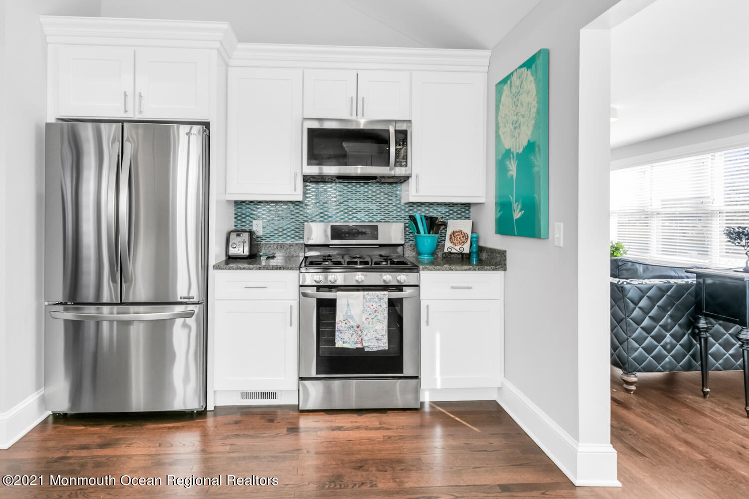 72 Rumson Road Little Silver, NJ 07739 - Photo 5 of 27 a kitchen with a refrigerator stove and wooden floor