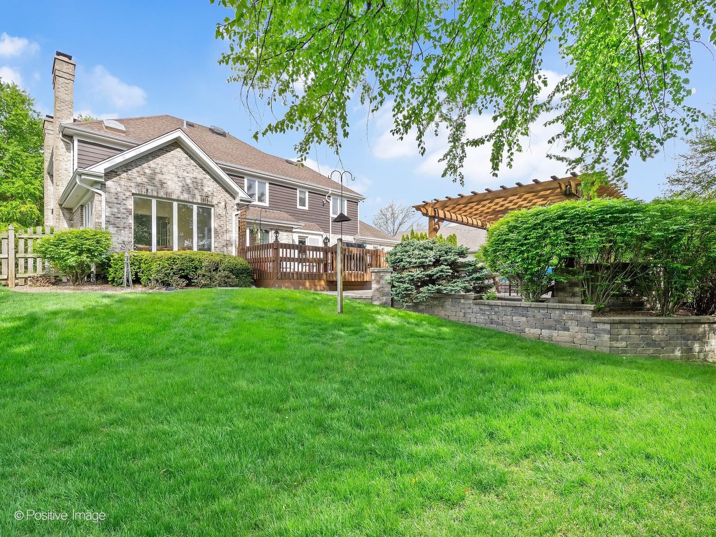 6451 Garfield Ridge Court Burr Ridge, IL 60527 - Photo 28 of 28 a front view of house with yard and green space