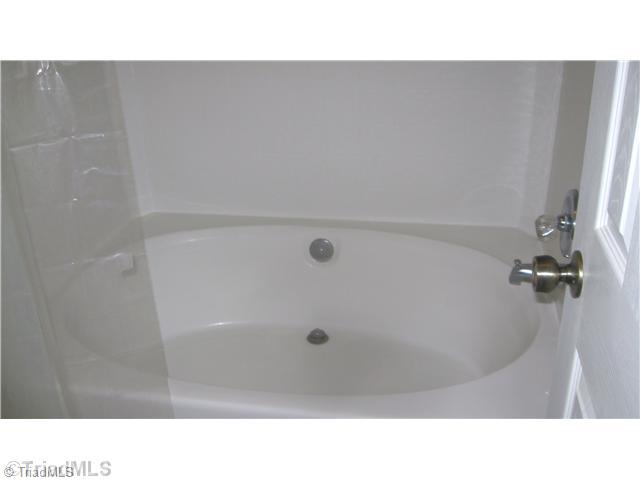 537 Covington Ridge Road Winston-Salem, NC 27107 - Photo 7 of 8 Exterior Front. Huge garden tub in spa bathroom spells relaxation.