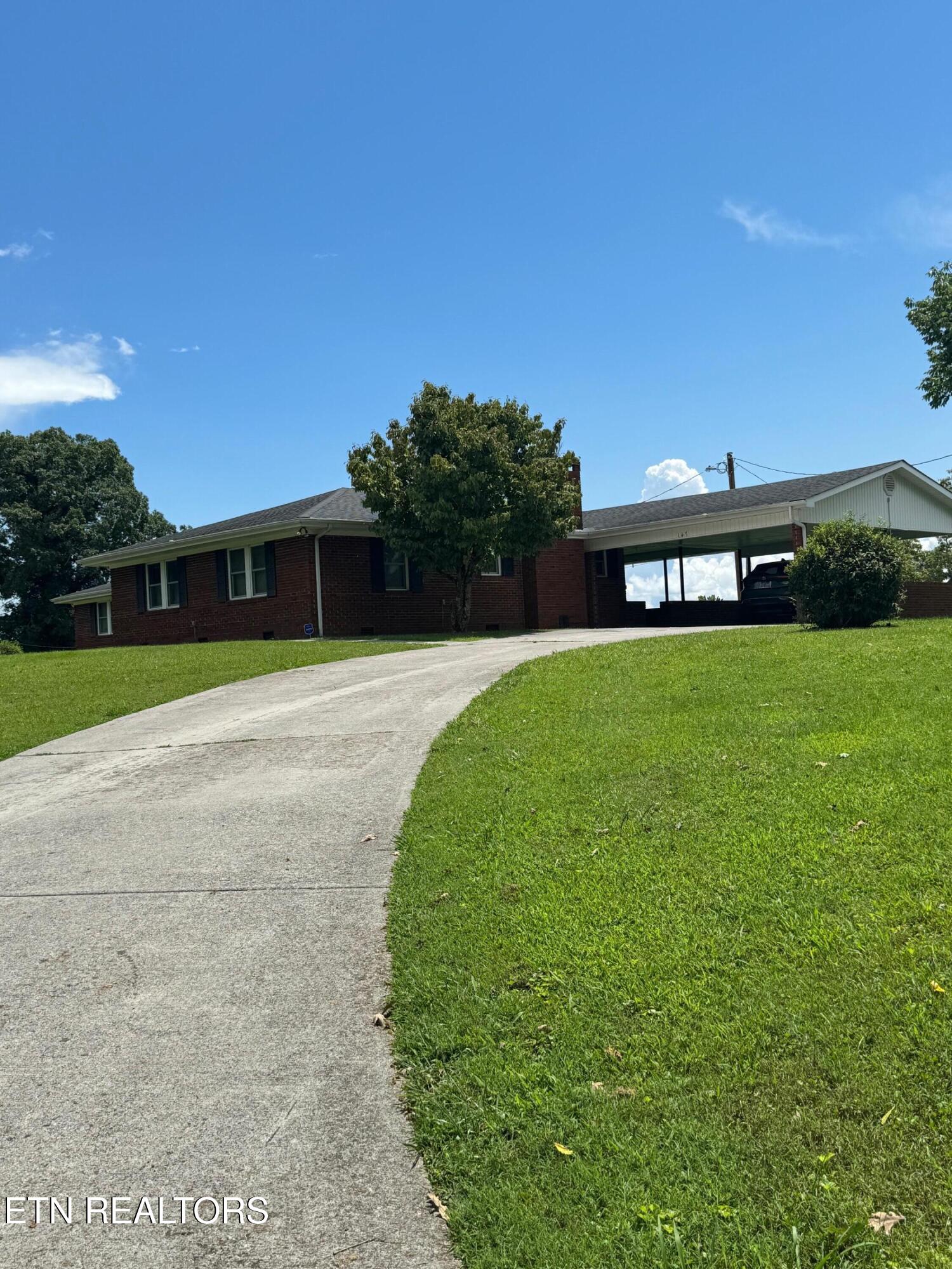 147 Meredith Road La Follette, TN 37766 - Photo 32 of 47 Driveway to 2 car carport
