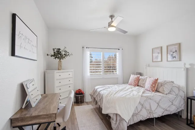 a bedroom with a bed and furniture