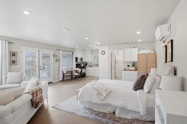 an aerial view of houses with yard